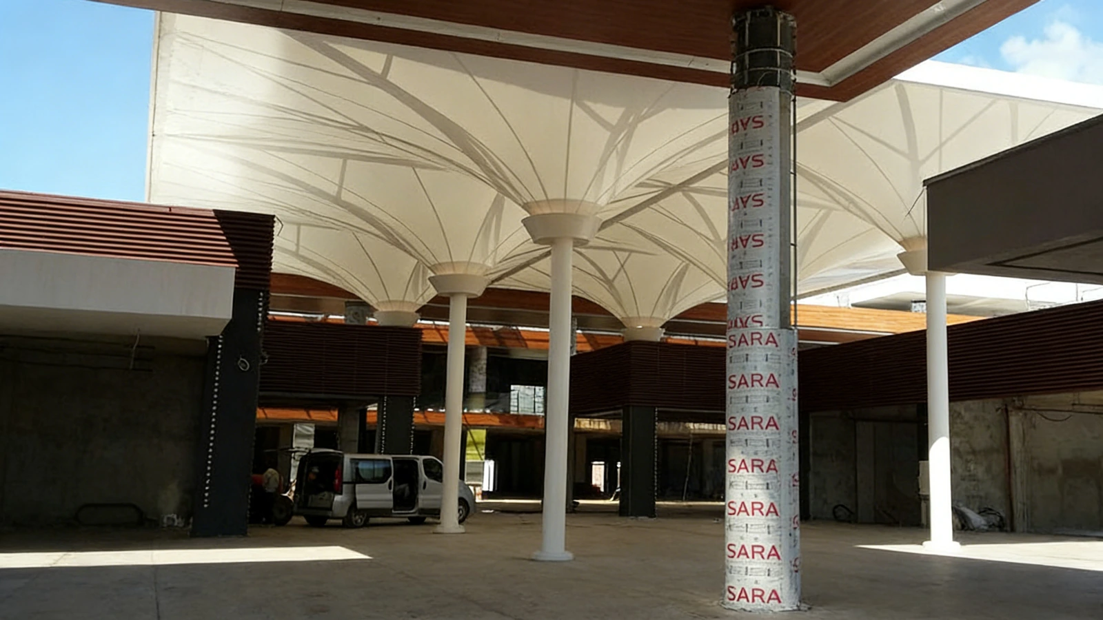 Inverted umbrella membrane canopies at a shopping mall entrance
