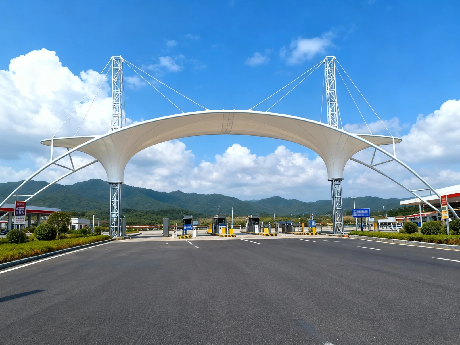 Twin-mast cable-stayed canopy over a toll plaza approach