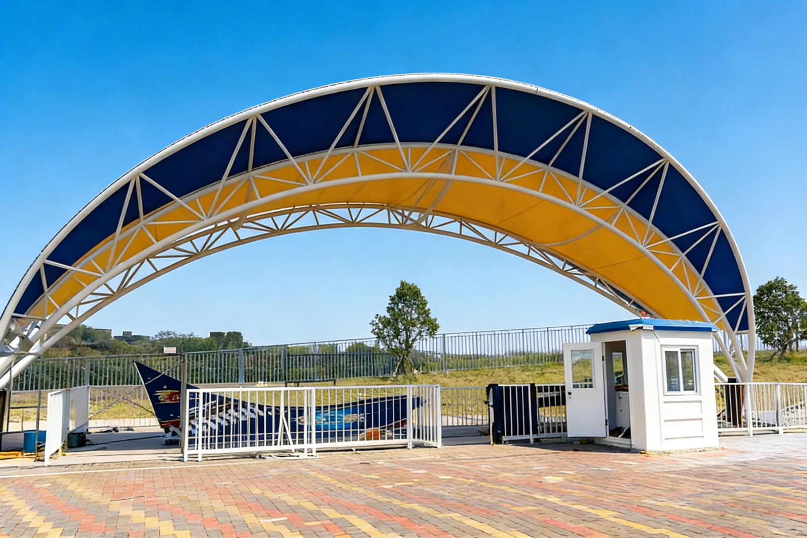 Coloured arched membrane canopy at a toll booth island